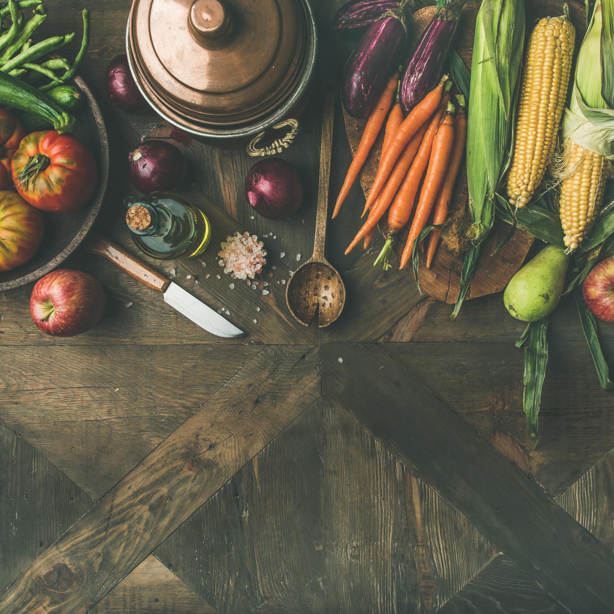 Workshop table with fresh produce and tools