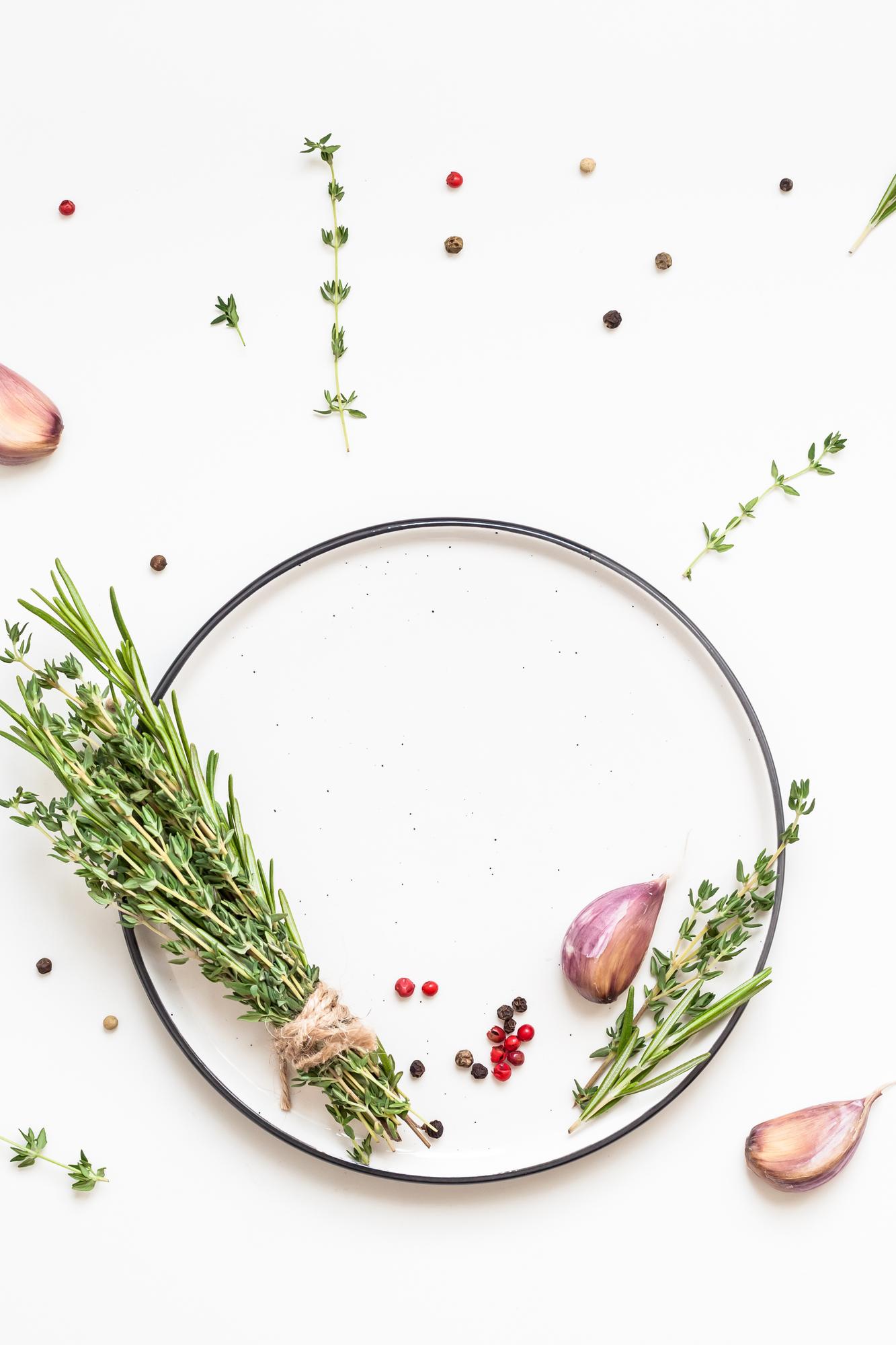Close-up of herbs and plated garnish